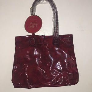 Brand new red Elizabeth Arden purse